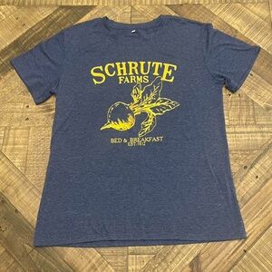 shirt features a graphic for Schrute Farms Bed & Breakfast